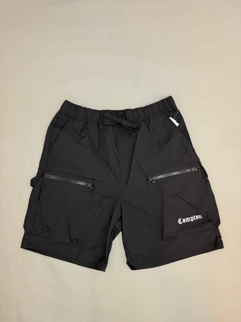 Shorts Compton Tactel bolso frontal